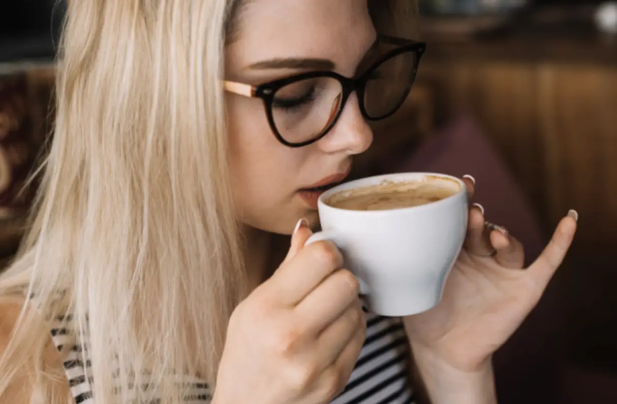 woman drinking coffee
